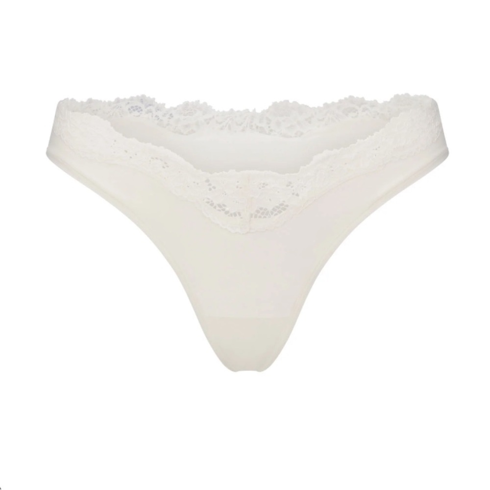 SKIMS Lace Dipped Thongs 5—Pack - Picture 8 of 8